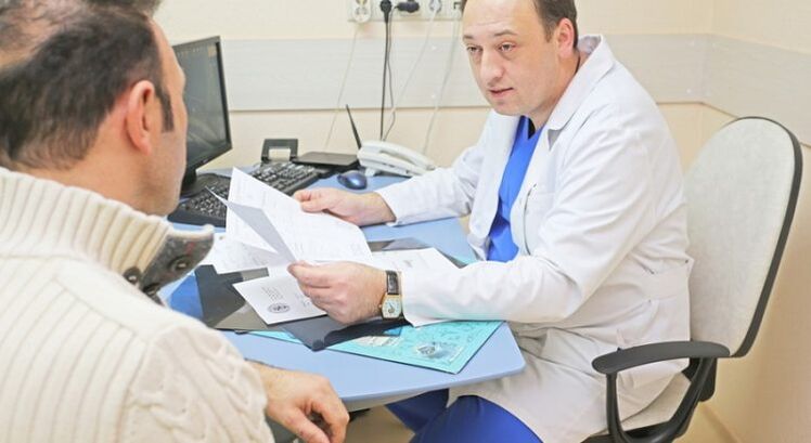 Man consulting urologist
